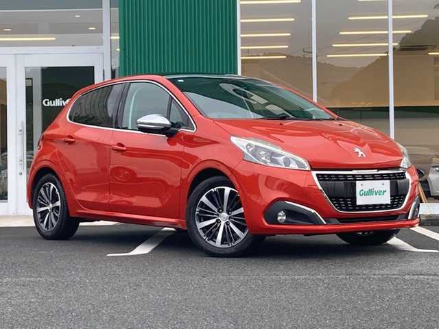 プジョー ２０８ アリュール シエロPKG 愛媛県 2016(平28)年 7.8万km オレンジ ガラスルーフ /衝突軽減ブレーキ/コーナーセンサー /カロッツエリアナビ /・CD DVD Blu-ray /・Bluetooth フルセグTV /バックカメラ /クルーズコントロール /ETC /リモコンキー /デュアルエアコン /トノカバー /アームレスト/純正16インチアルミ/社外アルミ車載/・スタッドレスタイヤ付き