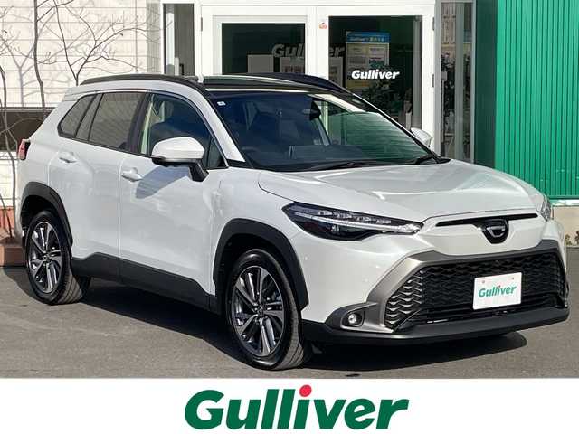 トヨタ カローラ クロス ハイブリッド Z 青森県 2025(令7)年 0.4万km プラチナホワイトパールマイカ 4WD/OP寒冷地仕様/OP純正10.5インチDオーディオプラスナビ・フルセグTV/Bluetooth・USB・Miracast/OPパノラミックビューモニター/OPパノラマルーフ/OPトヨタチームメイト/アドバンストパーク/パーキングサポートブレーキ/安心降車アシスト/ブラインドスポットモニター/セーフティセンス/プリクラッシュセーフティ/レーダークルーズコントロール/レーントレーシングアシスト/オートマチックハイビーム/ハーフレザーシート/運転席パワーシート/前席シートヒーター/ステアリングヒーター/パワーバックドア/純正前後ドライブレコーダー/純正ビルトインETC2.0/OP AC100V1500W/ワイパーデアイサー/LEDヘッドライト/LEDフォグランプ/LEDリアフォグランプ/純正18インチアルミ/ルーフレール