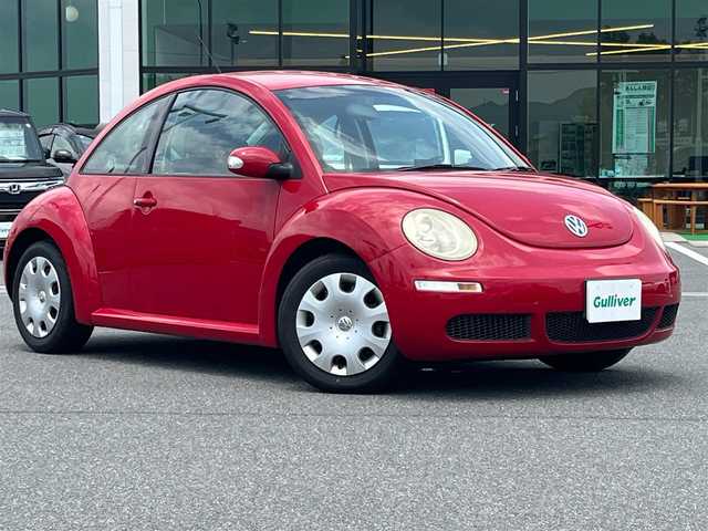 フォルクスワーゲン ニュー ビートル EZ 奈良県 2006(平18)年 1.7万km 赤 純正オーディオ(CD/AM・FM)/Yupiteruポータブルナビ(ワンセグTV)/リモコンキー/フロアマット/電格ミラー