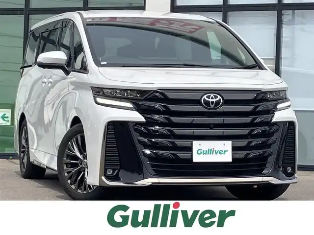 トヨタ ヴェルファイア ハイブリット Z プレミア 道南・函館 2023(令5)年 4.1万km プラチナホワイトパールマイカ ・純正ディスプレイオーディオ（コネクティッドナビ対応）/・フルセグTV/・カメラ一体型ドライブレコーダー/・パノラミックビューモニター/・ヘッドアップディスプレイ/・デジタルインナーミラー/・HDMI接続/・ルーフサンシェード/・サイドサンシェード/・両側パワースライドドア/・オートステップ/・パワーバックドア/・快適温熱シート（フロント・セカンドシート）/・ベンチレーションシート（フロント・セカンドシート）/・電動オットマン/・セカンドシートサイドテーブル/・ステアリングヒーター/・リヤヒーターエアカーテン/・ナノイーX/・ワイヤレスパワーコンソーシアム/・プリクラッシュセーフティ/・レーンディパーチャーアラート/・レーダークルーズコントロール/・ブラインドスポットモニター/・オートマチックハイビーム/・LEDヘッドライト/・オートライト/・エンジンプッシュスタート/・スマートキー/・保証書