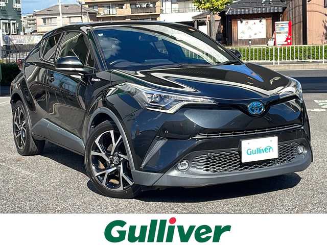 トヨタ Ｃ－ＨＲ ハイブリッド 1．8G 愛知県 2020(令2)年 6.3万km ブラックマイカ /禁煙者・ワンオーナー//純正ナビ【NSZT-W68T】//バックカメラ//フルセグTV・Bluetooth・CD//ビルトインETC//前後ドライブレコーダー//純正18インチアルミホイール//スペアタイヤ//ファブリック＋本革シート//快適温熱シート(前席)//Toyota Safety Sense//プリクラッシュセーフティ//レーンディパーチャーアラート//オートマチックハイビーム//レーダークルーズコントロール(全車速追従機能付)//ブラインドスポットモニター(BSM)//リヤクロストラフィックアラート//クリアランスソナー&バックソナー//横滑り防止//トラクションコントロール//車両接近通報//ヒルスタートアシスト//LEDヘッドライト//オートライト//フロントフォグランプ//電動格納ミラーウィンカー//スマートエントリー&スタートシステム//イモビライザー//プッシュスタート//ドライブモード(スポーツ・ノーマル・エコ)//EVドライブモード//ナノイー//純正フロアマット//電動ランバーサポート//本革巻きステアリング//ステアリングスイッチ//電子パーキングブレーキ//ブレーキホールド//スペアキー1本//新車保証書・取扱説明書//ナビ説明書