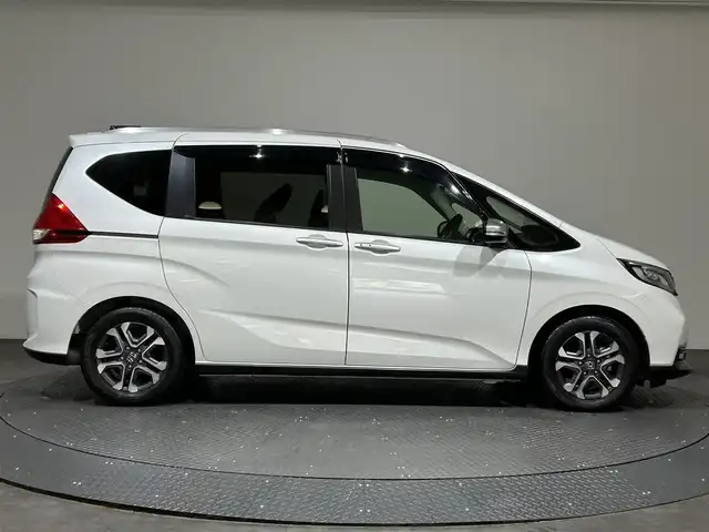 ホンダ フリード クロスター ホンダセンシング 愛媛県 2022(令4)年 1.3万km プラチナホワイトパール ・ホンダセンシング/・アクティブコーナリングライト/・純正メモリーナビ/・バックカメラ/・ETC/・ドライブレコーダー/・ハーフレザーシート/・前席シートヒーター/・LEDヘッドライト/・フォグランプ/・スマートキー