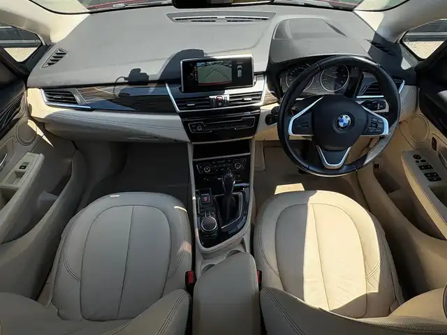 ＢＭＷ ２１８ｄ アクティブツアラー ラグジュアリー 石川県 2016(平28)年 6万km 赤 純正HDDナビ/バックカメラ/Bluetooth/USB/AUX/インテリジェントセーフティ/アンビエントライト/電動格納ミラー/オートライト/LEDヘッドライト/フォグランプ/ベージュ革/パワーシート/メモリーシート/シートヒーター/クリアランスソナー/コンフォートアクセス/電動リアゲート/フットトランクオープナー/トノカバー/ミラー一体型ETC/ドライブレコーダー