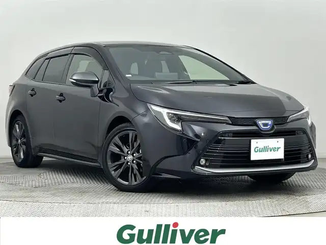 トヨタ カローラツーリング ハイブリッド ダブルバイビー 道央・札幌 2024(令6)年 2.6万km アティチュードブラックマイカ ・4WD/・寒冷地仕様/・トヨタセーフティセンス/・プリクラッシュセーフティ/・レーンキープアシスト/・レーダークルーズコントロール/・オートハイビーム/・ブラインドスポットモニター/・標識認識システム/・純正ディスプレイオーディオ/・ナビ機能/フルセグ/Bluetooth/・バックカメラ/・ビルトインETC/・オートブレーキホールド/・ミラーヒーター/・ステアリングスイッチ/・スマートキー/・プッシュスタート/・電格ミラー