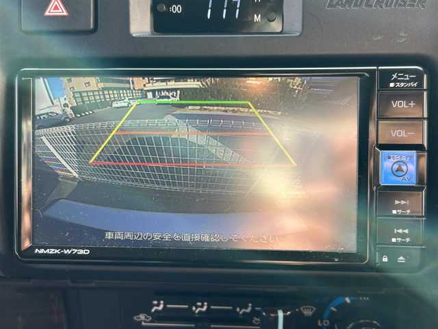 トヨタ ランドクルーザー AX 東京都 2024(令6)年 1.1万km スーパーホワイトⅡ ワンオーナー/モデリスタインテリアパネルセット/純正ＳＤナビ/CD/DVD/FM・AM/Bluetooth//フルセグTV/バックカメラ/ETC2.0/ドライブレコーダー前後/プリクラッシュセーフティ/レーンディパーチャーアラート/オートハイビーム/ロードサインアシスト/クルーズコントロール/LEDヘッドライト/LEDフォグランプ/ハーフレザーシート/純正１６インチアルミホイール/電動デフロック/ヒルスタートアシストコントロール/ダウンヒルアシストコントロール/革巻きステアリングホイール/バックモニター内蔵自動防眩ルームミラー/純正フロアマット/リモコンキー/新車時保証書/取扱説明書/スペアキー