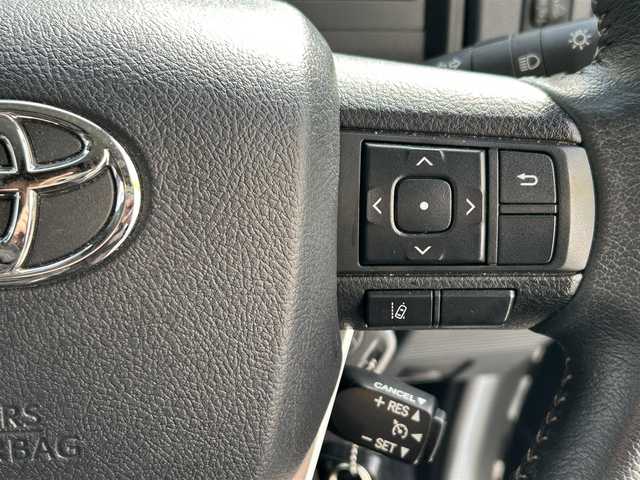 トヨタ ランドクルーザー AX 東京都 2024(令6)年 1.1万km スーパーホワイトⅡ ワンオーナー/モデリスタインテリアパネルセット/純正ＳＤナビ/CD/DVD/FM・AM/Bluetooth//フルセグTV/バックカメラ/ETC2.0/ドライブレコーダー前後/プリクラッシュセーフティ/レーンディパーチャーアラート/オートハイビーム/ロードサインアシスト/クルーズコントロール/LEDヘッドライト/LEDフォグランプ/ハーフレザーシート/純正１６インチアルミホイール/電動デフロック/ヒルスタートアシストコントロール/ダウンヒルアシストコントロール/革巻きステアリングホイール/バックモニター内蔵自動防眩ルームミラー/純正フロアマット/リモコンキー/新車時保証書/取扱説明書/スペアキー