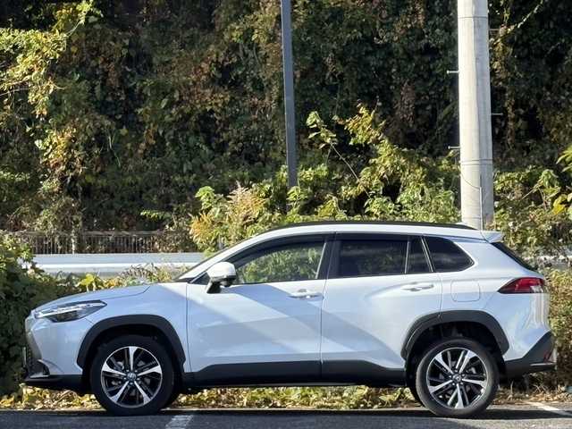 トヨタ カローラ クロス Z 大分県 2025(令7)年 0.2万km プラチナホワイトパールマイカ ワンオーナー /純正メモリーナビ/フルセグ /Bluetooth/純正LEDヘッドライト/オートライトコントロール/オートハイビームアシスト/ハーフレザーシート/パワーシート/シートヒーター/アダプティブクルーズコントロール/レーンキプアシスト/トヨタセーフティセンス/スマートキー/エンジンプッシュスタート/純正18インチアルミホイール