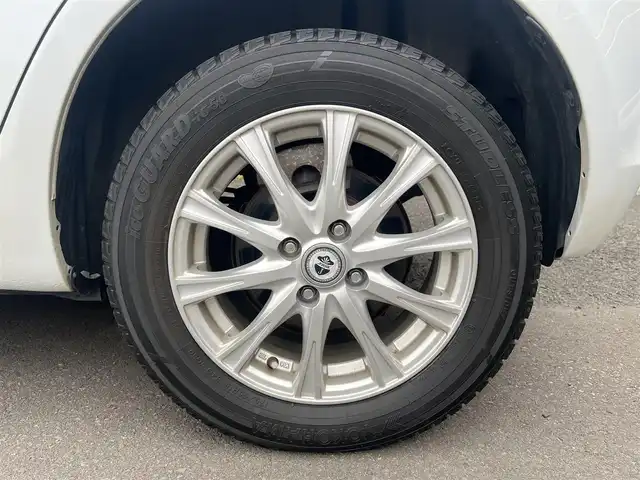 スズキ スイフト XG 秋田県 2014(平26)年 5.7万km スノーホワイトパール 社外ナビ/４WD/ワンセグ/社外アルミ/スマートキー/プッシュスタート/前席シートヒーター/純正フロアマット/純正ドアバイザー/オートエアコン/パワーステアリング/パワーウィンドウ/レベライザー/横滑り防止/盗難防止装置/電動格納ミラー/保証書/取扱説明書/記録簿