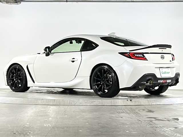 トヨタ ＧＲ８６ SZ 広島県 2022(令4)年 4万km クリスタルホワイトパール 禁煙車/アドバンレーシング18インチアルミホイール/社外マフラー/社外サスペンション/クルーズコントロール/横滑り防止/純正ナビ（NSCD-W68）/・ワンセグ/CD/SD/Bluetooth/バックカメラ/革巻きステアリング/ステアリングスイッチ/LEＤヘッドライト/ＳＹＮＣ/ETC/前後ドライブレコーダー（DC-DR652）/W+サイド+カーテンエアバック