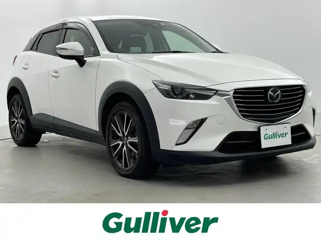 マツダ ＣＸ－３ XD ツーリング 福井県 2016(平28)年 7万km クリスタルホワイトパールマイカ ターボ/純正SDナビ/ (フルセグTV/Bluetooth/DVD/USB)/バックカメラ/ETC/ハーフレザーシート/i-ACTIVSENSE/・マツダレーダークルーズコントロール（MRCC）/・スマートブレーキサポート（SBS）/・アドバンストスマートシティブレーキサポート（アドバンストSCBS）/・レーンキープアシストシステム＆車線逸脱警報システム（LAS & LDWS）/・ブラインドスポットモニタリング（BSM）/ヘッドアップディスプレイ/横滑り防止装置/スマートキー/純正18インチアルミホイール/パドルシフト/オートライト/純正LEDヘッドライト/スペアキー1本/保証書/取扱説明書