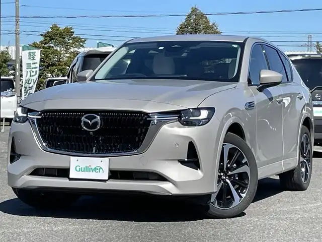 マツダ ＣＸ－６０ XD HV プレミアムモダン 道央・札幌 2022(令4)年 6.2万km プラチナクォーツメタリック ４WD/BOSEサウンドシステム/純正メーカーナビ/AM/FM/BT/フルセグ/衝突被害軽減ブレーキ/横滑り防止装置/トランクションコントロールシステム/レーダークルーズコントロール/ダウンヒルアシストコントロール/クリアランスソナー/ブラインドスポットモニター/全方位カメラ/ビルトインETC/ドライブレコーダー/アイドリングストップ/Mi-DRIVE/サンルーフ/パワーバックドア/メモリーリアゲート/前席パワーシート/D席メモリーシート/全席シートヒーター/前席エアシート/レザーシート/革巻きステアリング/ステアリングリモコン/パドルシフト/AC100V/置くだけ充電/電動パーキング/オートブレーキホールド/プッシュスタート/スマートキー/LEDヘッドライト/オートライト/フォグランプ/電動格納ミラー/ウィンカーミラー/純正フロアマット