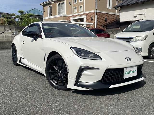 トヨタ ＧＲ８６ RZ 福岡県 2023(令5)年 0.2万km クリスタルホワイトパール 【ワンオーナー】/登録時距離1187Km/社外ナビ（AM/FM/CD/DVD/SD/USB/AUX/Bluetooth/フルセグTV）/革調シートカバー/クルーズコントロール/横滑り防止/シートヒーター（運転席/助手席）/ETC/オートライト/フォグランプ/純正フロアマット/純正アルミホイール/プッシュスタート/保証書/取扱説明書/スペアキー×１