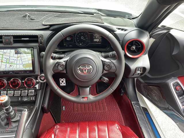 トヨタ ＧＲ８６ RZ 福岡県 2023(令5)年 0.2万km クリスタルホワイトパール 【ワンオーナー】/登録時距離1187Km/社外ナビ（AM/FM/CD/DVD/SD/USB/AUX/Bluetooth/フルセグTV）/革調シートカバー/クルーズコントロール/横滑り防止/シートヒーター（運転席/助手席）/ETC/オートライト/フォグランプ/純正フロアマット/純正アルミホイール/プッシュスタート/保証書/取扱説明書/スペアキー×１