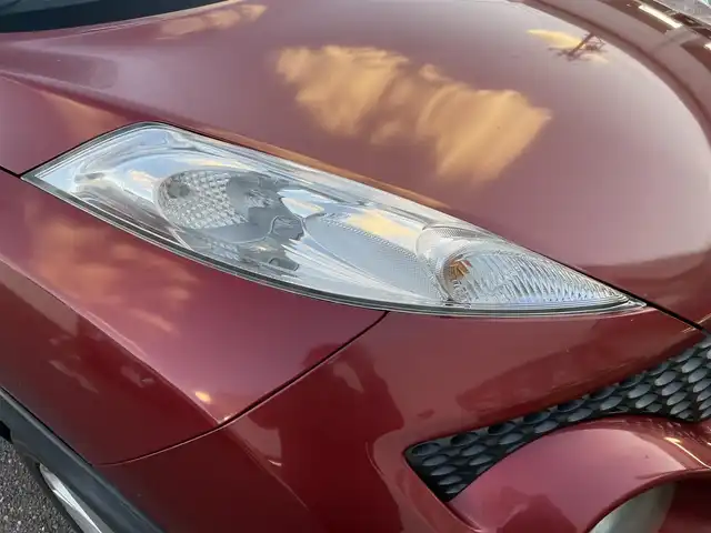 日産 ジューク 16GT FOUR 新潟県 2012(平24)年 16.6万km ラディアントレッド ４WD/ターボ/フルオートタイマー/メモリナビ/ワンセグテレビ/バックカメラ/ドアバイザー/ETC/純正ホイール夏タイヤ装着/純正フロアマット/Bluetooth/電動格納ドアミラー