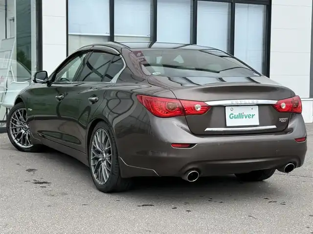 日産 スカイライン ハイブリッド 350GT FOUR TypeSP 道南・函館 2014(平26)年 8.8万km ブラックパール ・純正ＨＤＤナビ（ＣＤ、ＤＶＤ，ＴＶ）/・フルセグＴＶ/・全方位カメラ/・衝突軽減ブレーキ/・クルーズコントロール/・前後コーナーセンサー/・前席パワーシート/・前席シートヒーター/・純正エンジンスターター/・スペアキー/・プッシュスタート/・冬タイヤ積込（純正ＡＷ）/・純正フロアマット