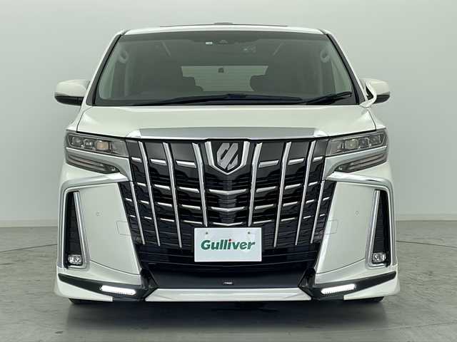 トヨタ アルファード S Cパッケージ 宮城県 2020(令2)年 6.9万km ラグジュアリーホワイトパールクリスタルシャインガラスフレーク ツインムーンルーフ/TRDエアロ/デジタルインナーミラー/純正12.1インチフリップダウンモニター/トヨタセーフティーセンス/・レーダークルーズコントロール/・レーントレーシングアシスト/・プリクラッシュセーフティーシステム/・アダプティブハイビームシステム/ブラインドスポットモニター/3眼LEDヘッドライト/LEDフォグランプ/前席シートヒーター・エアシート/純正9.2インチディスプレイオーディオ（BT.AM.FM.USB.CD.DVD）/フルセグTV/DVDキット/バックカメラ/前後ドライブレコーダー/ビルトインETC/電動リアゲート/両側パワースライドドア/電動パーキングブレーキ/シートメモリー/前席パワーシート/合皮シート/オットマン/ステアリングヒーター/ウッドコンビステアリング/革巻きステアリング/ステアリングスイッチ/プッシュスタート/スマートキー/純正エンジンスターター/nanoeエアコン/ロールサンシェード/サンバイザー/純正フロアマット/純正17インチアルミホイール