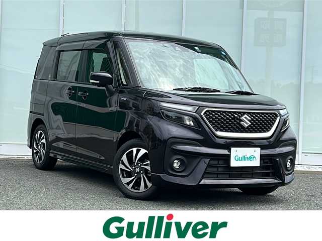 スズキ ソリオ バンディット HV MV 福岡県 2022(令4)年 3.8万km グリッターバイオレットパール ・9インチナビ/（BLUETOOTH/フルセグ/バックカメラ/・アラウンドビューモニター/・ビルトインETC/・ドライブレコーダー/・ヘッドアップディスプレイ/・スペアキー/・純正アルミホイール/・純正フロアマット/・両側パワースライドドア/・シートヒーター/・LEDヘッドライト/・天井サーキュレーター/・クルーズコントロール/・アイドリングストップ/・クリアランスソナー/・オールリトラミラー/・コーナーセンサー/・レーンキープアシスト/・横滑り防止装置/・衝突軽減システム/・USB入力端子/・センターウォークスルー/・オートライト/・保証書/・取扱説明書