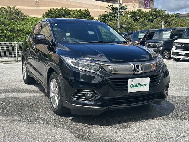 ホンダ ヴェゼル ハイブリッド X ホンダセンシング 沖縄県 2019(令1)年 6.8万km クリスタルブラックパール ナビ　/（ＡＭ／ＦＭ／ＣＤ／ＤＶＤ／ＢＴ）　/バックモニター　/衝突軽減　/クルーズコントロール　/ＥＴＣ　/純正フロアマット　/レーンキープアシスト　/純正１６ＡＷ　/ＬＥＤヘッドライト　/オートライト　/ＵＳＢ入力端子/スマートキー/横滑り防止