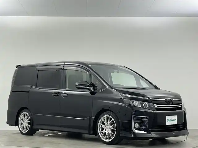トヨタ ヴォクシー ZS 埼玉県 2014(平26)年 7.7万km ブラック モデリスタエアロ　ＡＬＰＡＩＮＥ１０型ナビ　ＡＬＰＩＮＥ１１．４型後席モニター　両側電動スライドドア　バックカメラ　ＡＲＫＬＩＮＥ１８インチホイール　ＥＴＣ　ドラレコ　ＭＴモード付　車載冷温庫