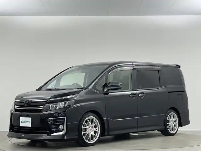 トヨタ ヴォクシー ZS 埼玉県 2014(平26)年 7.7万km ブラック モデリスタエアロ　ＡＬＰＡＩＮＥ１０型ナビ　ＡＬＰＩＮＥ１１．４型後席モニター　両側電動スライドドア　バックカメラ　ＡＲＫＬＩＮＥ１８インチホイール　ＥＴＣ　ドラレコ　ＭＴモード付　車載冷温庫