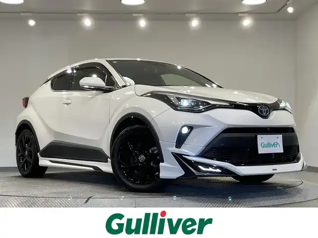 トヨタ Ｃ－ＨＲ G モード ネロ セーフティプラス 愛知県 2020(令2)年 8.4万km ホワイトパールクリスタルシャイン モデリスタエアロ F/S/R/純正DAナビ/全方位カメラ/純正ETC/シートヒーター/トヨタセーフティーセンス/アダクティブクルーズコントロール/衝突軽減ブレーキ/ブラインドスポットモニター/車線逸脱警報/標識検知機能/先行車発進お知らせ機能/LEDヘッドライト/フォグランプ/オートハイビーム/オートブレーキホールド/電子サイドブレーキ/スマートキー/プッシュスタート