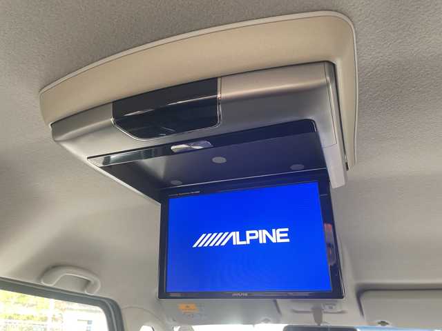 スズキ スペーシア カスタム TS 広島県 2015(平27)年 10.7万km パールホワイト 禁煙車/インタークーラーターボ/社外ナビ（CN-HW850D）/・フルセグ/CD/DVD/HDD/SD/バックカメラ/アルパインフリップダウンモニター（TMX-R3000）/ユピテルドライブレコーダー（TW8500）/ETC/HIDヘッドライト/フォグランプ/スマートキー/プッシュスタート/スペアキー/アルミ付きスタッドレスタイヤ車載/純正15インチアルミホイール/Wエアバック