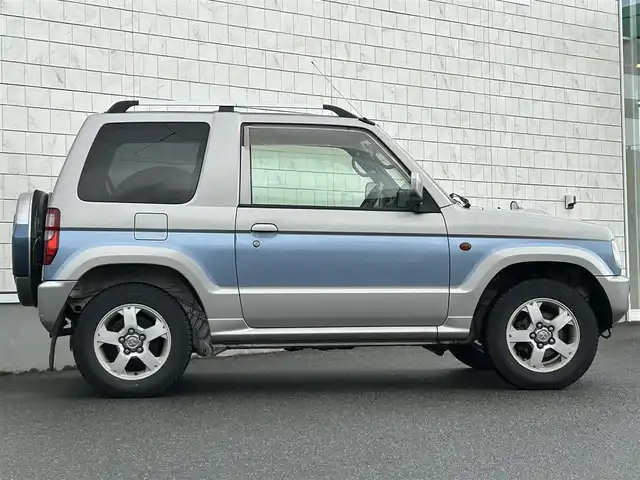 三菱 パジェロ ミニ スペシャルカラーED VR 山形県 2003(平15)年 10万km シルバーⅡ 4WD/社外オーディオ/・AM/FM/MD/ハロゲンヘッドライト/フロントフォグランプ/電動格納ミラー/ダブルエアバック/純正フロアマット/純正ドアバイザー/夏タイヤ積み込み/取扱説明書