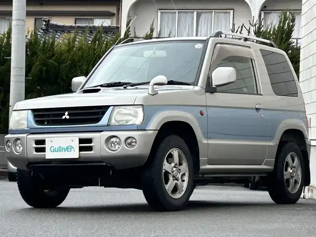 三菱 パジェロ ミニ スペシャルカラーED VR 山形県 2003(平15)年 10万km シルバーⅡ 4WD/社外オーディオ/・AM/FM/MD/ハロゲンヘッドライト/フロントフォグランプ/電動格納ミラー/ダブルエアバック/純正フロアマット/純正ドアバイザー/夏タイヤ積み込み/取扱説明書