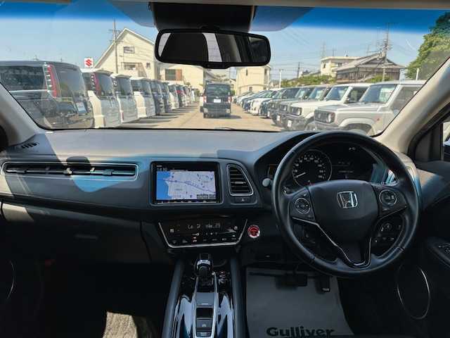 ホンダ ヴェゼル ハイブリッド Z ホンダセンシング 大阪府 2019(令1)年 3.6万km クリスタルブラックパール 純正８インチナビ　/フルセグ　/バックカメラ　/ハーフレザーシート　/シートヒーター　/レーダークルーズコントロール　/ルーフレール　/ビルトインＥＴＣ　/ＬＥＤヘッドライト　/マット　/バイザー