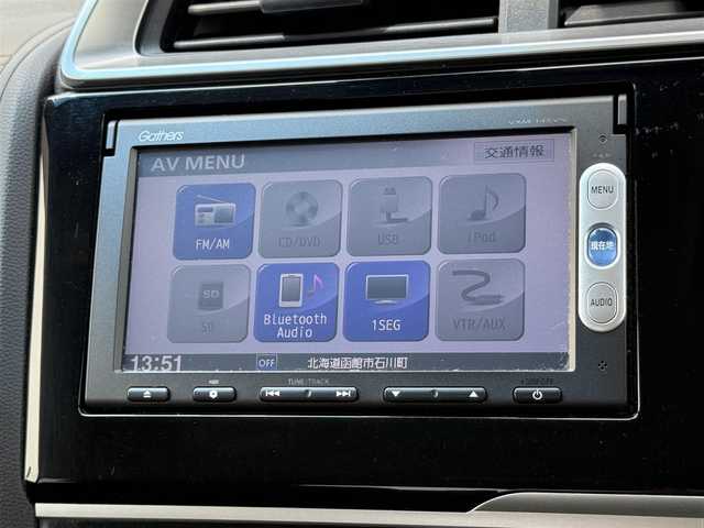 ホンダ フィット ハイブリット Fパッケージ 道南・函館 2014(平26)年 7.7万km ビビットスカイブルーP 純正ナビ/ワンセグＴＶ/衝突軽減ブレーキ/バックカメラ/寒冷地仕様/オートライト/ＨＩＤヘッドライト/ＵＳＢ・ＢＴ接続/社外フロアマット/アイドリングストップ/横滑り防止装置/電格ミラー
