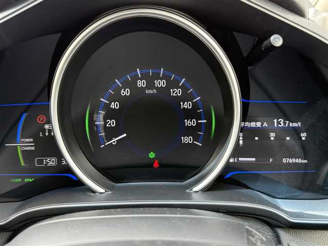 ホンダ フィット ハイブリット Fパッケージ 道北・旭川 2014(平26)年 7.7万km ビビットスカイブルーP 純正ナビ/ワンセグＴＶ/衝突軽減ブレーキ/バックカメラ/寒冷地仕様/オートライト/ＨＩＤヘッドライト/ＵＳＢ・ＢＴ接続/社外フロアマット/アイドリングストップ/横滑り防止装置/電格ミラー