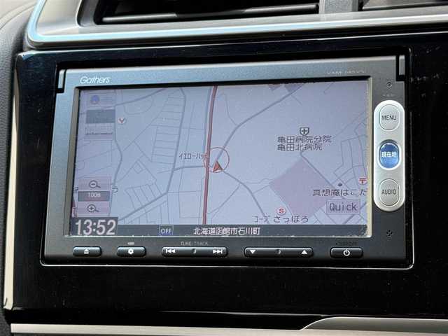 ホンダ フィット ハイブリット Fパッケージ 道北・旭川 2014(平26)年 7.7万km ビビットスカイブルーP 純正ナビ/ワンセグＴＶ/衝突軽減ブレーキ/バックカメラ/寒冷地仕様/オートライト/ＨＩＤヘッドライト/ＵＳＢ・ＢＴ接続/社外フロアマット/アイドリングストップ/横滑り防止装置/電格ミラー