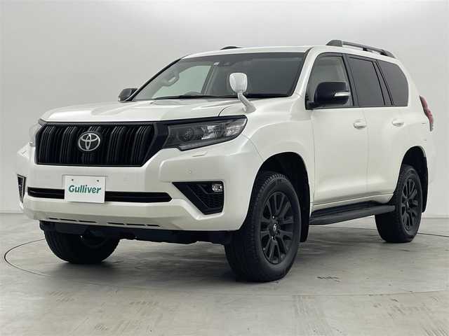 トヨタ ランドクルーザー プラド TX Lパッケージ マットブラED 群馬県 2023(令5)年 1.5万km ホワイトパールクリスタルシャイン 特別仕様車【マットブラックエディション】/チルト＆スライド電動ムーンルーフ（挟み込み防止機能付）/＝＝＝＝＝＝/社外9インチ　カロッツェリア　フローティングナビ/（SD/Bluetooth/USB/AUX/HDMI/フルセグTV)/社外カロッツェリア　後席モニター/バックカメラ /ベージュ本革シート/シートヒーター /シートベンチレーション/パワーシート /電動格納サードシート/Toyota Safety Sense/・プリクラッシュセーフティ/・レーンディパーチャーアラート/・オートマチックハイビーム/・レーダークルーズコントロール/・ロードサインアシスト/・先行車発進告知機能/・パーキングサポートブレーキ（前後方静止物）/ビルトインETC/ドライブレコーダー/ルーフレール/LEDヘッドライト/オートライト /Fフォグランプ/スマートキー/純正18インチAW