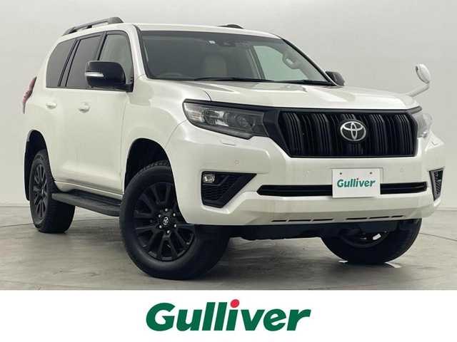 トヨタ ランドクルーザー プラド TX Lパッケージ マットブラED 群馬県 2023(令5)年 1.5万km ホワイトパールクリスタルシャイン 特別仕様車【マットブラックエディション】/チルト＆スライド電動ムーンルーフ（挟み込み防止機能付）/＝＝＝＝＝＝/社外9インチ　カロッツェリア　フローティングナビ/（SD/Bluetooth/USB/AUX/HDMI/フルセグTV)/社外カロッツェリア　後席モニター/バックカメラ /ベージュ本革シート/シートヒーター /シートベンチレーション/パワーシート /電動格納サードシート/Toyota Safety Sense/・プリクラッシュセーフティ/・レーンディパーチャーアラート/・オートマチックハイビーム/・レーダークルーズコントロール/・ロードサインアシスト/・先行車発進告知機能/・パーキングサポートブレーキ（前後方静止物）/ビルトインETC/ドライブレコーダー/ルーフレール/LEDヘッドライト/オートライト /Fフォグランプ/スマートキー/純正18インチAW