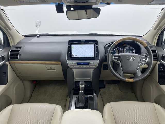 トヨタ ランドクルーザー プラド TX Lパッケージ マットブラED 群馬県 2023(令5)年 1.5万km ホワイトパールクリスタルシャイン 特別仕様車【マットブラックエディション】/チルト＆スライド電動ムーンルーフ（挟み込み防止機能付）/＝＝＝＝＝＝/社外9インチ　カロッツェリア　フローティングナビ/（SD/Bluetooth/USB/AUX/HDMI/フルセグTV)/社外カロッツェリア　後席モニター/バックカメラ /ベージュ本革シート/シートヒーター /シートベンチレーション/パワーシート /電動格納サードシート/Toyota Safety Sense/・プリクラッシュセーフティ/・レーンディパーチャーアラート/・オートマチックハイビーム/・レーダークルーズコントロール/・ロードサインアシスト/・先行車発進告知機能/・パーキングサポートブレーキ（前後方静止物）/ビルトインETC/ドライブレコーダー/ルーフレール/LEDヘッドライト/オートライト /Fフォグランプ/スマートキー/純正18インチAW
