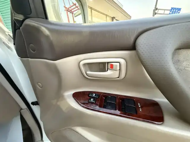 トヨタ ランドクルーザー VX－LTD 香川県 2001(平13)年 9.7万km ホワイトパールマイカ ワンオーナー/ウッドコンビステア/クルーズコントロール/社外LEDヘッドライト/社外16インチアルミ/純正マット/ETC