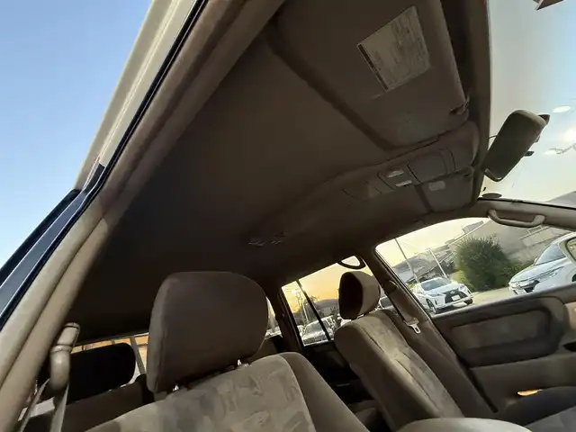 トヨタ ランドクルーザー VX－LTD 香川県 2001(平13)年 9.7万km ホワイトパールマイカ ワンオーナー/ウッドコンビステア/クルーズコントロール/社外LEDヘッドライト/社外16インチアルミ/純正マット/ETC