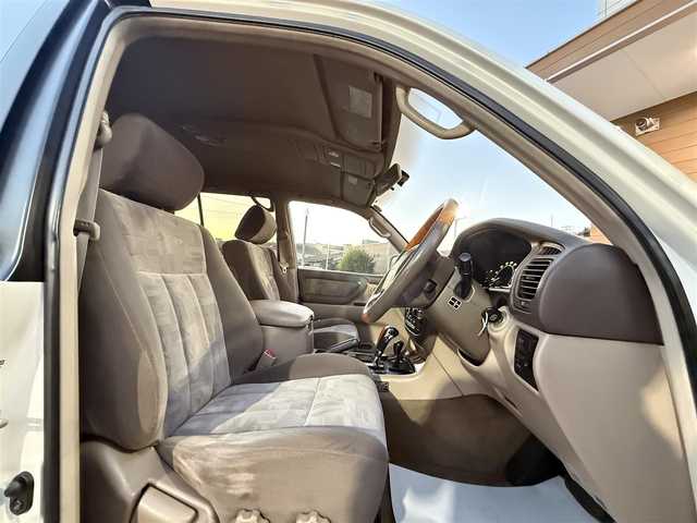 トヨタ ランドクルーザー VX－LTD 香川県 2001(平13)年 9.7万km ホワイトパールマイカ ワンオーナー/ウッドコンビステア/クルーズコントロール/社外LEDヘッドライト/社外16インチアルミ/純正マット/ETC
