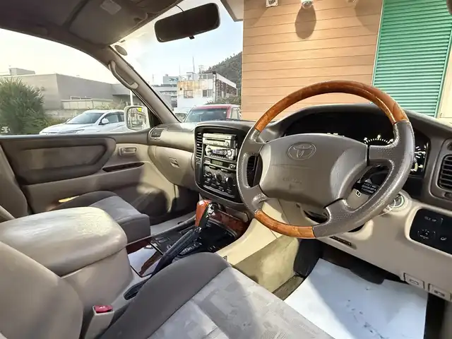 トヨタ ランドクルーザー VX－LTD 香川県 2001(平13)年 9.7万km ホワイトパールマイカ ワンオーナー/ウッドコンビステア/クルーズコントロール/社外LEDヘッドライト/社外16インチアルミ/純正マット/ETC