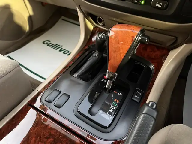 トヨタ ランドクルーザー VX－LTD 香川県 2001(平13)年 9.7万km ホワイトパールマイカ ワンオーナー/ウッドコンビステア/クルーズコントロール/社外LEDヘッドライト/社外16インチアルミ/純正マット/ETC