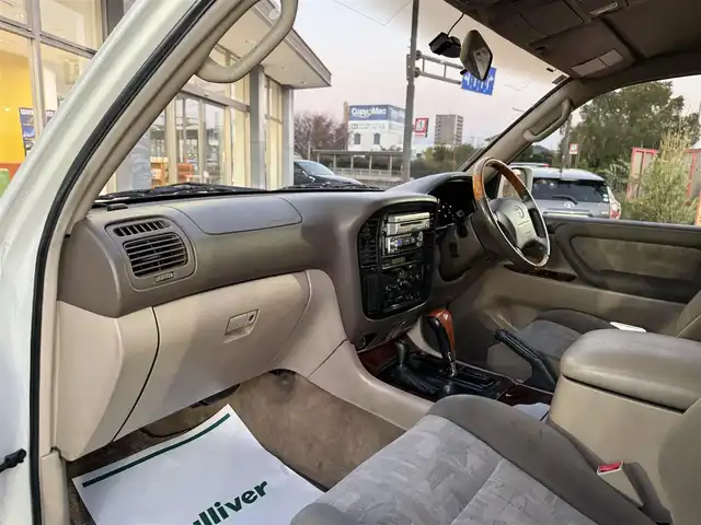 トヨタ ランドクルーザー VX－LTD 香川県 2001(平13)年 9.7万km ホワイトパールマイカ ワンオーナー/ウッドコンビステア/クルーズコントロール/社外LEDヘッドライト/社外16インチアルミ/純正マット/ETC