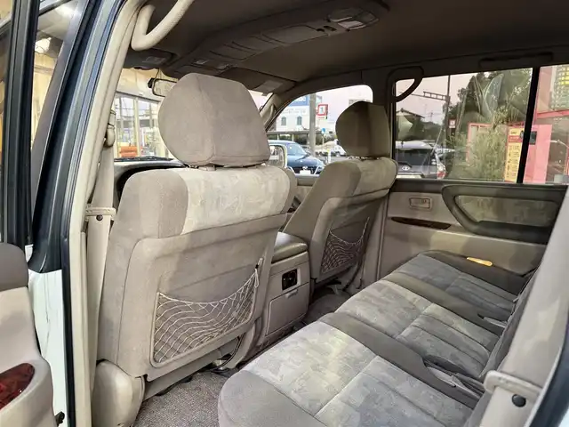 トヨタ ランドクルーザー VX－LTD 香川県 2001(平13)年 9.7万km ホワイトパールマイカ ワンオーナー/ウッドコンビステア/クルーズコントロール/社外LEDヘッドライト/社外16インチアルミ/純正マット/ETC