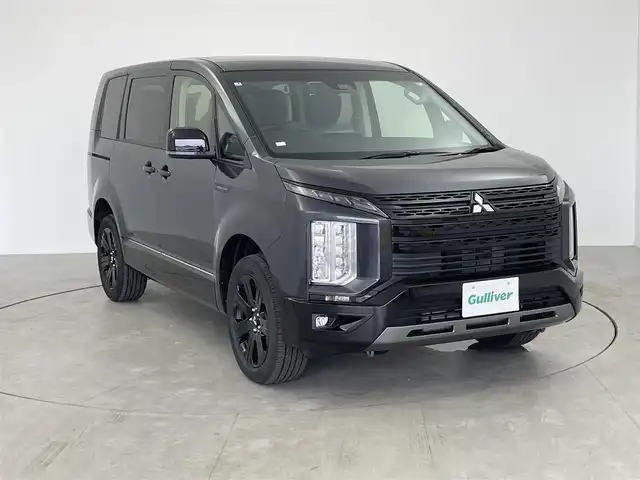 三菱 デリカＤ：５ シャモニー 愛知県 2025(令7)年 0.1万km未満 グラファイトグレーメタリック/ブラックマイカ 未使用車/4WD/両側パワースライドドア/アラウンドビュー装着車モニター装着車/レーダークルーズコントロール/バックカメラ/パワーバックドア/8人乗り/プッシュスタート/ステアリングリモコン/パドルシフト/ステアリングヒーター/WAC/電動パーキングブレーキ/オートホールド/自動防眩ミラー/オートライト/オートハイビーム/デイライト/フォグランプ/純正アルミホイール
