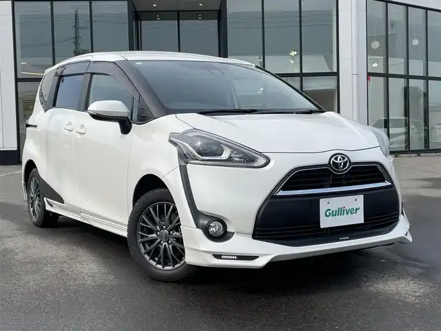 トヨタ シエンタ G クエロ 青森県 2018(平30)年 9.1万km ホワイトパールクリスタルシャイン ・4WD/・寒冷地仕様/・社外ナビ(MDV-S809L)/・AM/FM/CD/Bluetooth/・フルセグTV/・バックカメラ/・フロントワイパーデアイサー/・横滑り防止装置/・衝突被害軽減ブレーキ/・車線逸脱防止装置/・両側パワースライドドア/・シートヒーター(D＋N席)/・前後ドライブレコーダー/・純正TRDエアロ/・純正ドアバイザー/・ハーフレザーシート/・夏タイヤ社外AW積み込み/・プッシュスタート/・スペアキー/・取扱説明書/・保証書