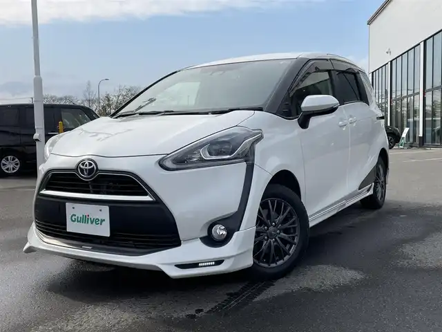 トヨタ シエンタ G クエロ 青森県 2018(平30)年 9.1万km ホワイトパールクリスタルシャイン ・4WD/・寒冷地仕様/・社外ナビ(MDV-S809L)/・AM/FM/CD/Bluetooth/・フルセグTV/・バックカメラ/・フロントワイパーデアイサー/・横滑り防止装置/・衝突被害軽減ブレーキ/・車線逸脱防止装置/・両側パワースライドドア/・シートヒーター(D＋N席)/・前後ドライブレコーダー/・純正TRDエアロ/・純正ドアバイザー/・ハーフレザーシート/・夏タイヤ社外AW積み込み/・プッシュスタート/・スペアキー/・取扱説明書/・保証書
