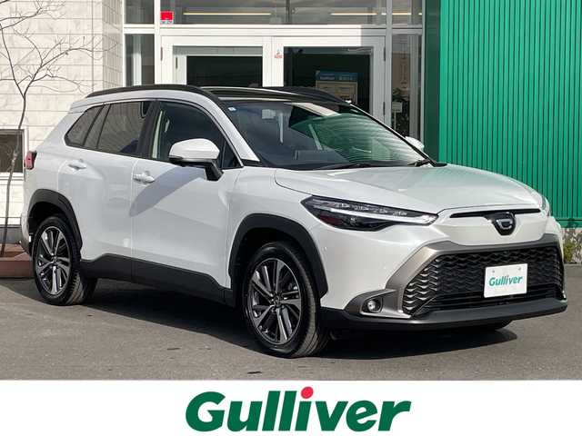 トヨタ カローラ クロス ハイブリッド Z 青森県 2025(令7)年 0.4万km プラチナホワイトパールマイカ 4WD/OP寒冷地仕様/OP純正10.5インチDオーディオプラスナビ・フルセグTV/Bluetooth・USB・Miracast/OPパノラミックビューモニター/OPパノラマルーフ/OPトヨタチームメイト/アドバンストパーク/パーキングサポートブレーキ/安心降車アシスト/ブラインドスポットモニター/セーフティセンス/プリクラッシュセーフティ/レーダークルーズコントロール/レーントレーシングアシスト/オートマチックハイビーム/ハーフレザーシート/運転席パワーシート/前席シートヒーター/ステアリングヒーター/パワーバックドア/純正前後ドライブレコーダー/純正ビルトインETC2.0/OP AC100V1500W/ワイパーデアイサー/LEDヘッドライト/LEDフォグランプ/LEDリアフォグランプ/純正18インチアルミ/ルーフレール