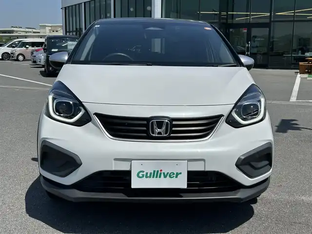 ホンダ フィット クロスター 奈良県 2020(令2)年 0.4万km プラチナホワイトパール ９インチプレミアインターナビ　/フルセグテレビ　/bluetooth/純正ドライブレコーダー前後　/バックカメラ　/ホンダセンシング　/コーナーセンサー前後　/追従クルーズコントロール/レーンキープアシスト/2トーン　/純正アルミホイール　/純正フロアマット　/カーテンエアバッグ/LEDヘッドライト/USBポート　/スペアキー