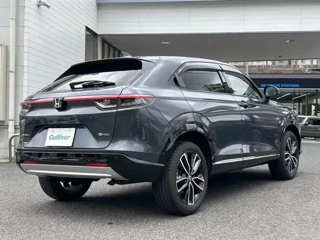 ホンダ ヴェゼル ハイブリッド e:HEV Z 長崎県 2023(令5)年 1.3万km メテオロイドグレーメタリック ワンオーナー/プッシュスタート/保証書/取扱説明書/スマートキー/渋滞追従機能付きアダプティブクルーズコントロール/Hondaコネクトディスプレイ(BT/AM/FM/フルセグ/ナビ)/USB入力端子/ETC2.0/ワイヤレス充電/バックカメラ/純正フロアマット/純正18インチアルミホイール/運転席・助手席シートヒーター/ABS/VSA(ビークルスタビリティアシスト)/LKAS(車線維持支援システム)/イモビライザーシステム/衝突軽減ブレーキ/前後ソナーセンサー/ヒルディセントコントロール/ドライブモードセレクト/パワーテールゲート/パドルシフト/オートライト/オートハイビーム
