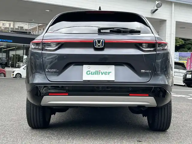ホンダ ヴェゼル ハイブリッド e:HEV Z 長崎県 2023(令5)年 1.3万km メテオロイドグレーメタリック ワンオーナー/プッシュスタート/保証書/取扱説明書/スマートキー/渋滞追従機能付きアダプティブクルーズコントロール/Hondaコネクトディスプレイ(BT/AM/FM/フルセグ/ナビ)/USB入力端子/ETC2.0/ワイヤレス充電/バックカメラ/純正フロアマット/純正18インチアルミホイール/運転席・助手席シートヒーター/ABS/VSA(ビークルスタビリティアシスト)/LKAS(車線維持支援システム)/イモビライザーシステム/衝突軽減ブレーキ/前後ソナーセンサー/ヒルディセントコントロール/ドライブモードセレクト/パワーテールゲート/パドルシフト/オートライト/オートハイビーム