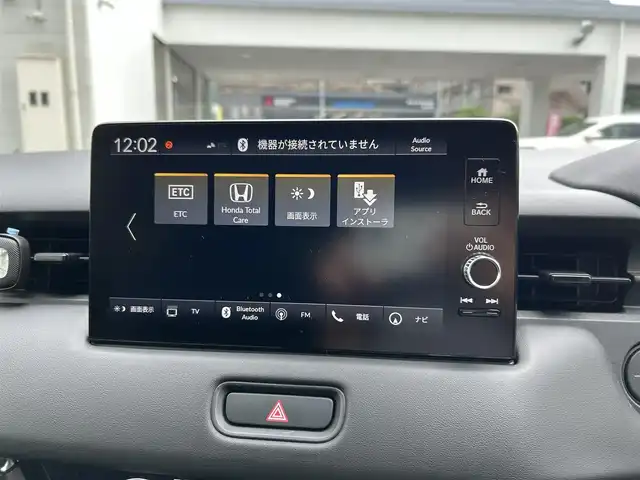 ホンダ ヴェゼル ハイブリッド e:HEV Z 長崎県 2023(令5)年 1.3万km メテオロイドグレーメタリック ワンオーナー/プッシュスタート/保証書/取扱説明書/スマートキー/渋滞追従機能付きアダプティブクルーズコントロール/Hondaコネクトディスプレイ(BT/AM/FM/フルセグ/ナビ)/USB入力端子/ETC2.0/ワイヤレス充電/バックカメラ/純正フロアマット/純正18インチアルミホイール/運転席・助手席シートヒーター/ABS/VSA(ビークルスタビリティアシスト)/LKAS(車線維持支援システム)/イモビライザーシステム/衝突軽減ブレーキ/前後ソナーセンサー/ヒルディセントコントロール/ドライブモードセレクト/パワーテールゲート/パドルシフト/オートライト/オートハイビーム